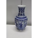 A Japanese blue & white vase with character marks to the base