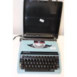 A vintage Silver Reed portable typewriter