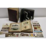 Two vintage postcard albums & a empty album