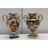 A matched pair of Regency period Crown Bloor Derby two handled vases in the Japan pattern