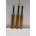 Three signed miniature cricket bats from the 1940's & 1961