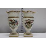 A pair of blush ivory porcelain hand decorated vases (damaged)