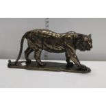 A metal finish sculpture of a tiger