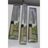 Three boxed new Japanese kitchen knives