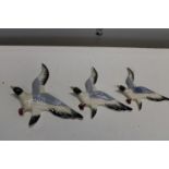 Three vintage wall hanging ceramic birds