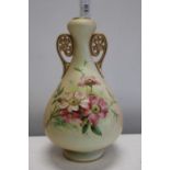A hand decorated Royal Worcester blush ivory vase stamped 961 to the base. 21cm tall