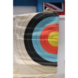 A large canvas archery target