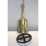 A John Linwood warranted brass bottle jack spit rotisserie. With key