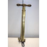 A vintage Nesthill air compressor/stirrup pump