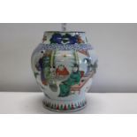 A 19th century Chinese Wucai baluster vase in the 17th century style. painted with immortals &