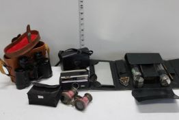 A selection of vintage cameras, binoculars and mens vanity set