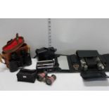 A selection of vintage cameras, binoculars and mens vanity set