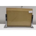 A Art Deco period chromed photo frame. 33cm x 22cm