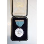 A hallmarked silver medal for the London college of Music 1909