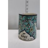 A vintage Jerusalem ceramic mug with BOAC logo & text below