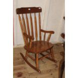 A vintage elm rocking chair