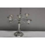 A silver plated candlestick