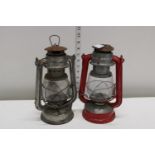 Two Tilley lamp style lamps
