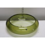 A large nice green glass bowl