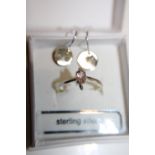 A Sterling silver ring & set of Sterling silver earrings