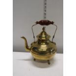 A three Footed Brass Kettle