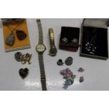 A selection of costume jewellery & watches etc
