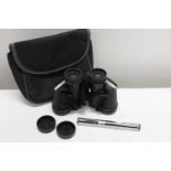 A pair of 8 x 30 binoculars & pocket scope