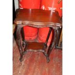 An Edwardian occasional table in mahogany with under shelf collection only. 75cm tall