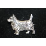 A hallmarked silver scottie dog brooch