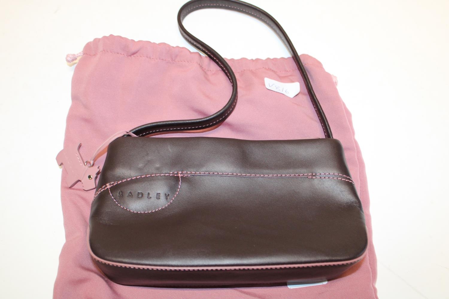 A ladies Radley handbag with dust bag