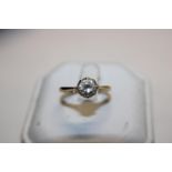 A 9ct gold ring with a CZ solitaire