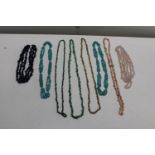 A selection of natural stone costume necklaces