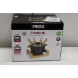 A boxed Princess fondue set