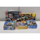 Five boxed Lego models