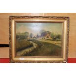 A gilt framed oil on board