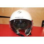 A crash helmet size medium