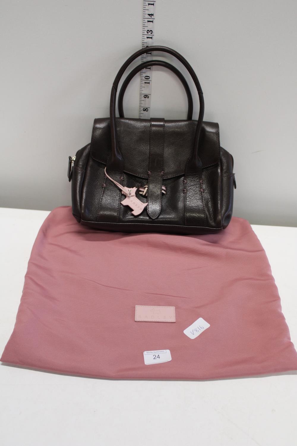 A ladies Radley handbag with dust bag