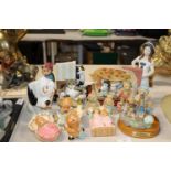 A selection of figurines including Pendelfin and Crown Devon