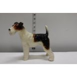 A vintage ceramic dog