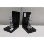 A pair of chess related book ends