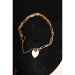 A 9ct gold gate bracelet 11.9g