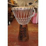 A vintage floor standing African style drum collection only