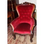 A late Victorian open arm fireside chair in mahogany with red upholstery collection only