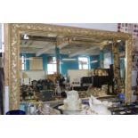 A large gilt framed mirror with bevelled edge glass 137x96cm collection only