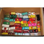 A box full of Matchbox die-cast models