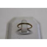 An 18ct gold ring 1.2g