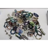 A job lot of costume bangles