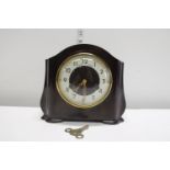 A vintage Smiths Enfield mantel clock in a bakelite case