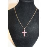 A 9ct rose gold chain & 9ct gold cross with pink stones