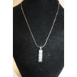 A Sterling silver ingot & chain